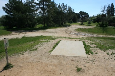 Woodward Legacy DGC, Main course, Hole 18 Short tee pad