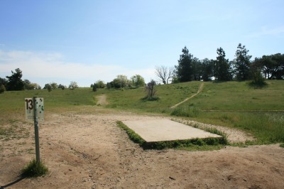 Woodward Legacy DGC, Main course, Hole 13 Short tee pad